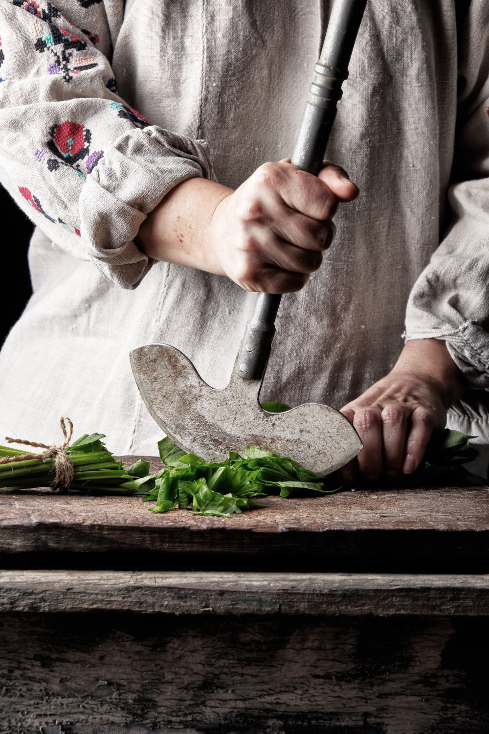 Roman Woman chopping herbs